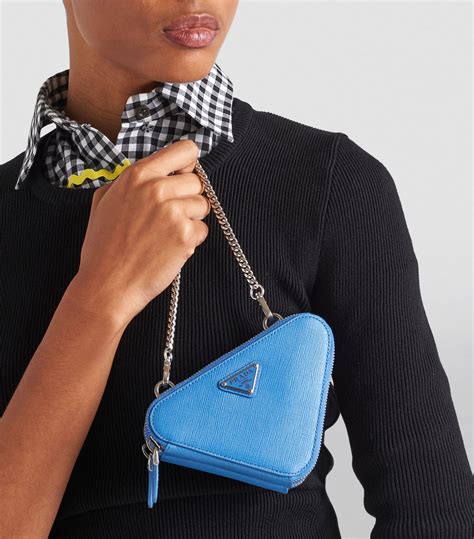 prada mini curved leather crossbody bag|Prada bag with mini pouch.